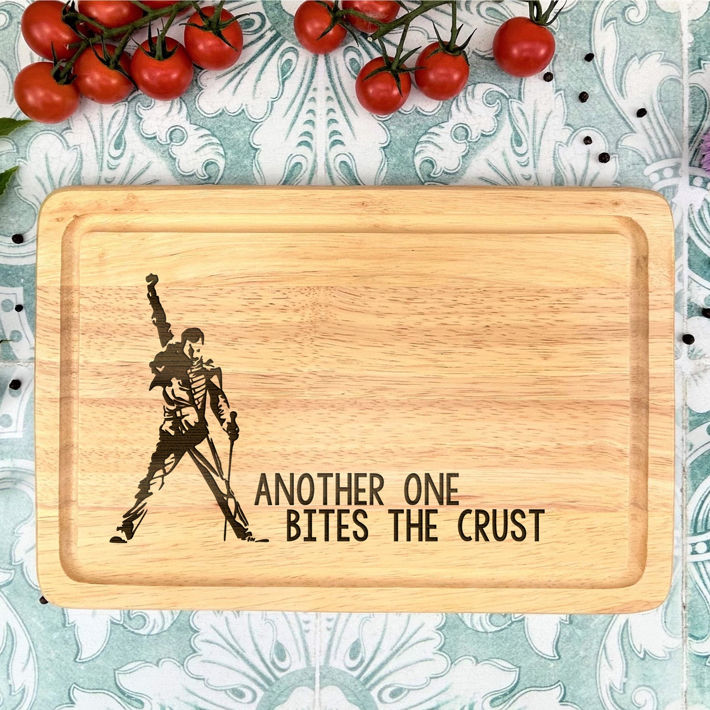a cutting board with a picture of a man holding a sword