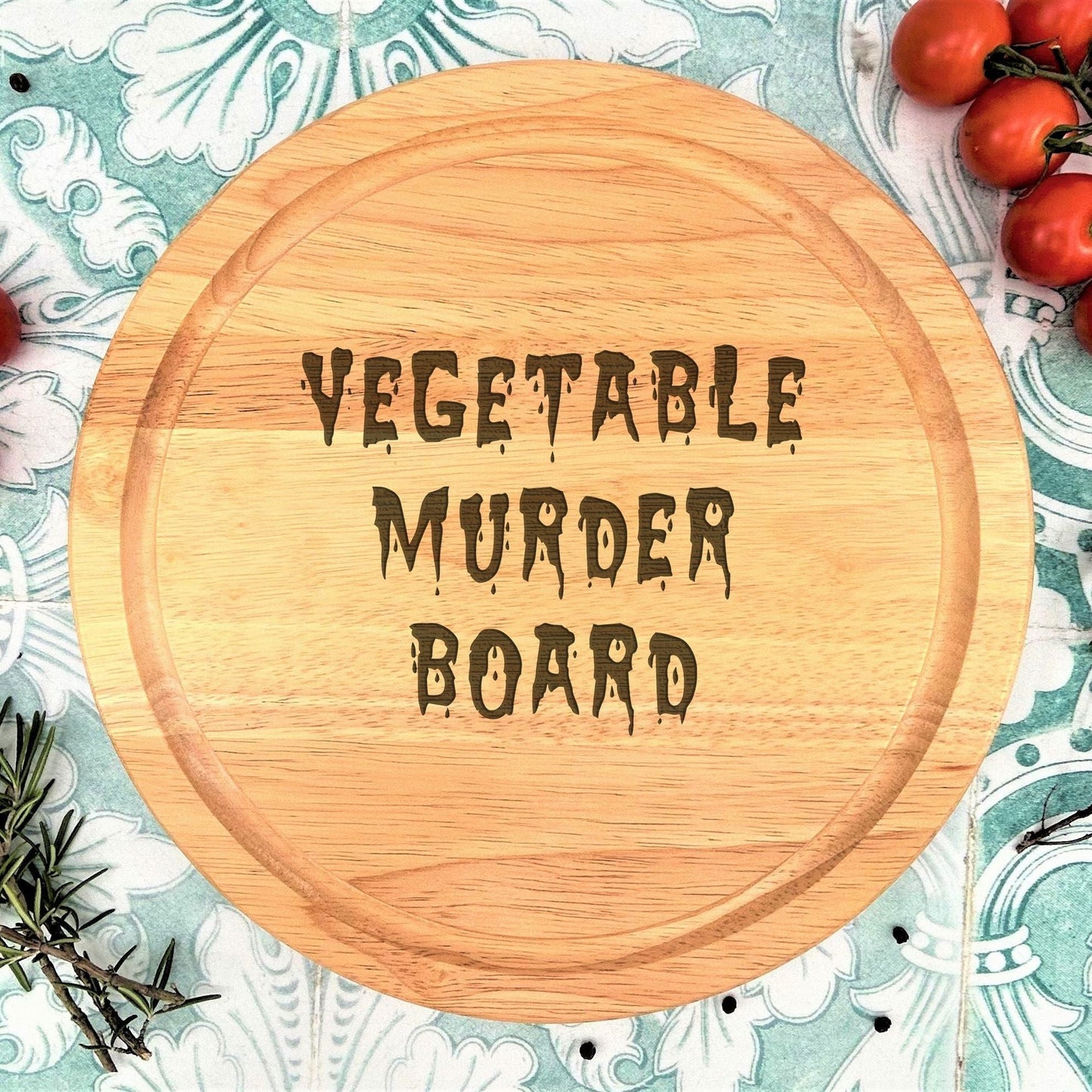 a wooden board with the words vegetable murder board on it
