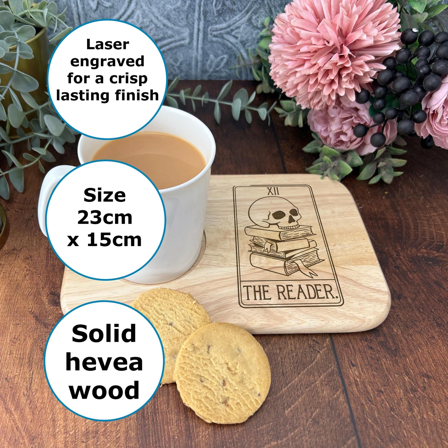 a cup of coffee and some cookies on a table