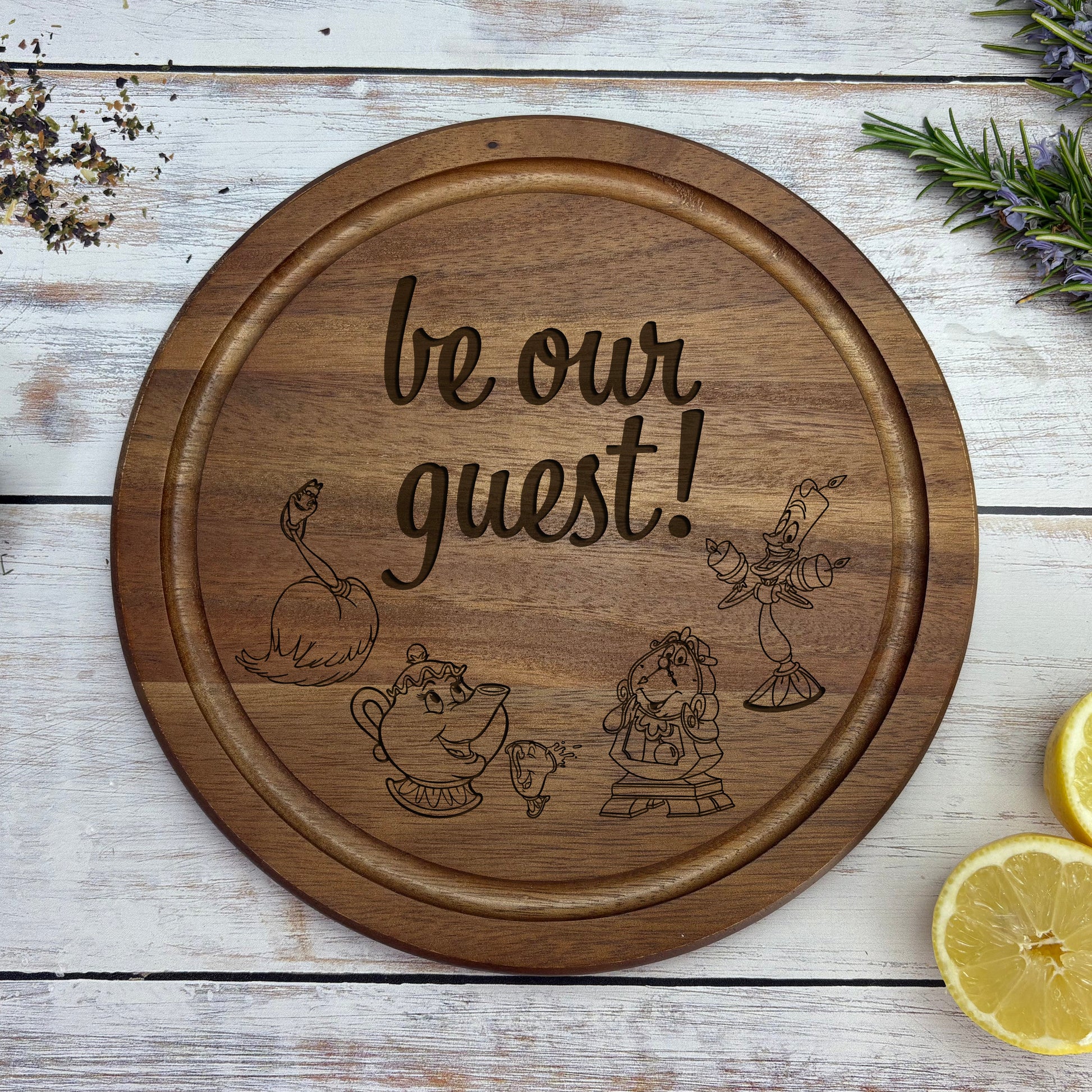a wooden sign that says, be our guest