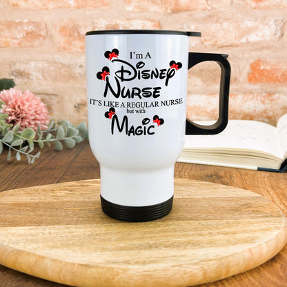 a white coffee mug sitting on top of a wooden table