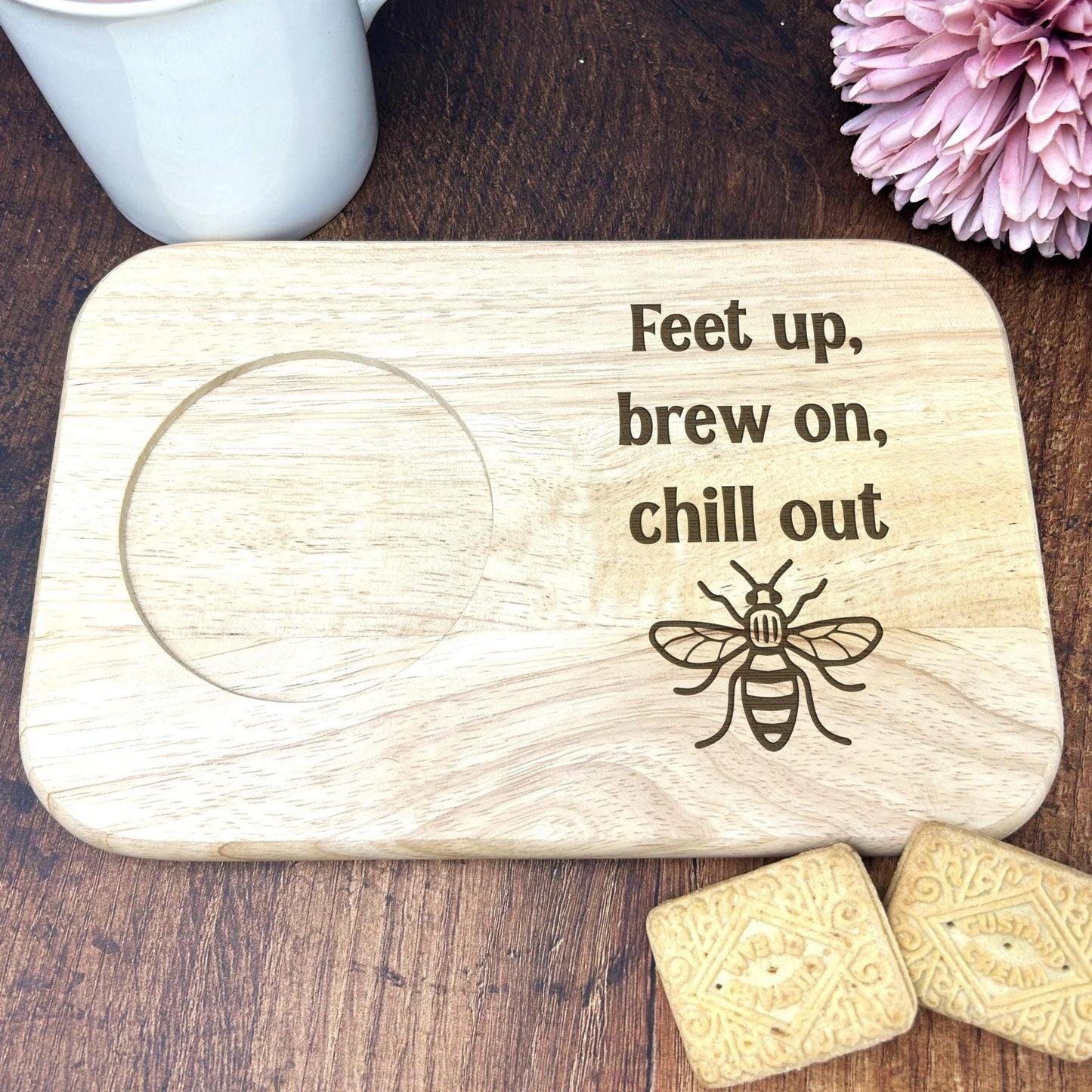 a wooden coaster that says feet up, brew on, chill out