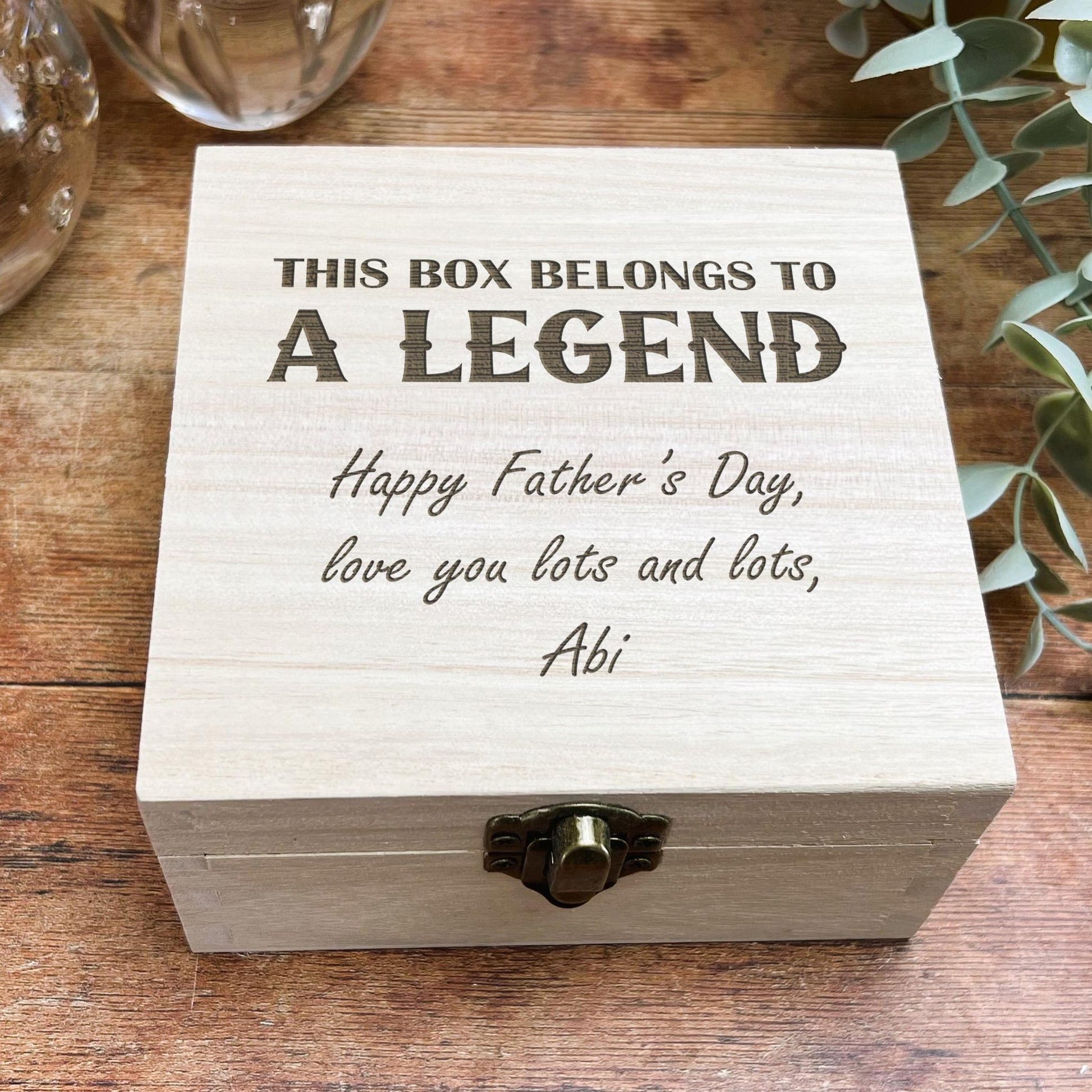 a wooden box that has a message on it