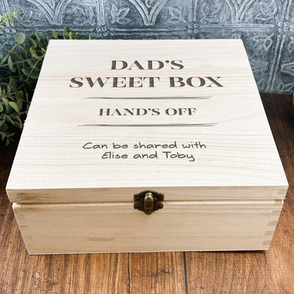 a wooden box that says dad's sweet box hands off can be shared with