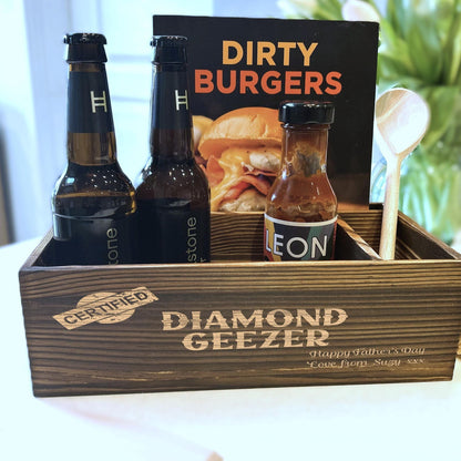 a wooden box filled with bottles of beer