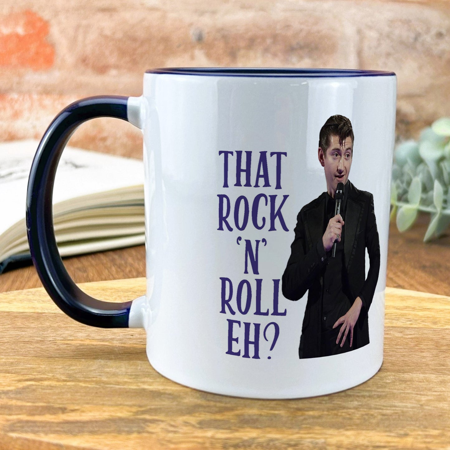 a coffee mug with a picture of a man holding a microphone