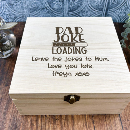 a wooden box sitting on top of a wooden table