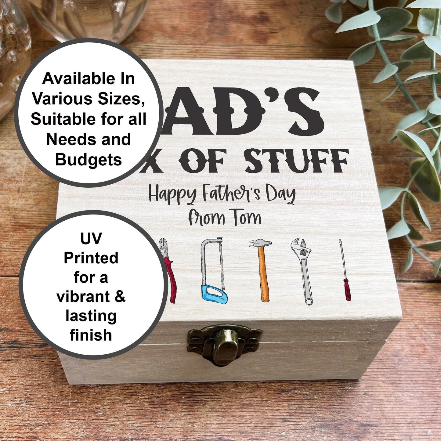 a wooden box with a picture of different items inside of it