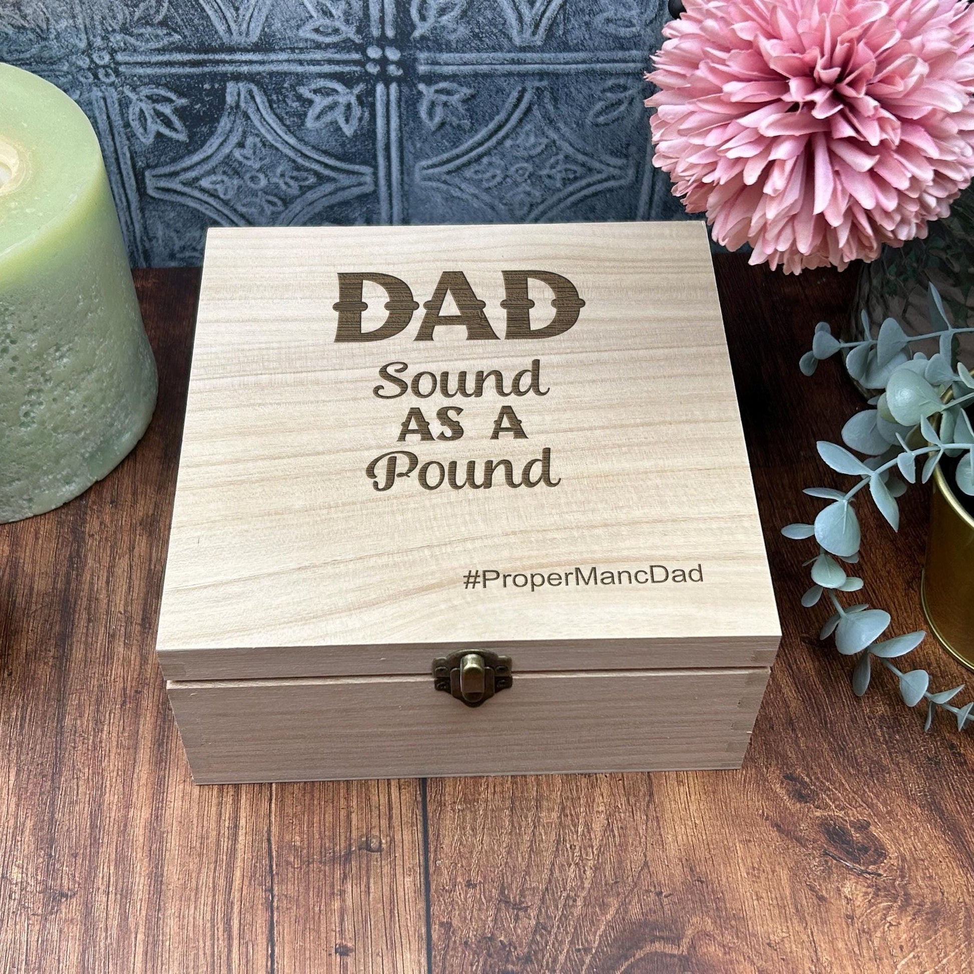 a wooden box sitting on top of a wooden table