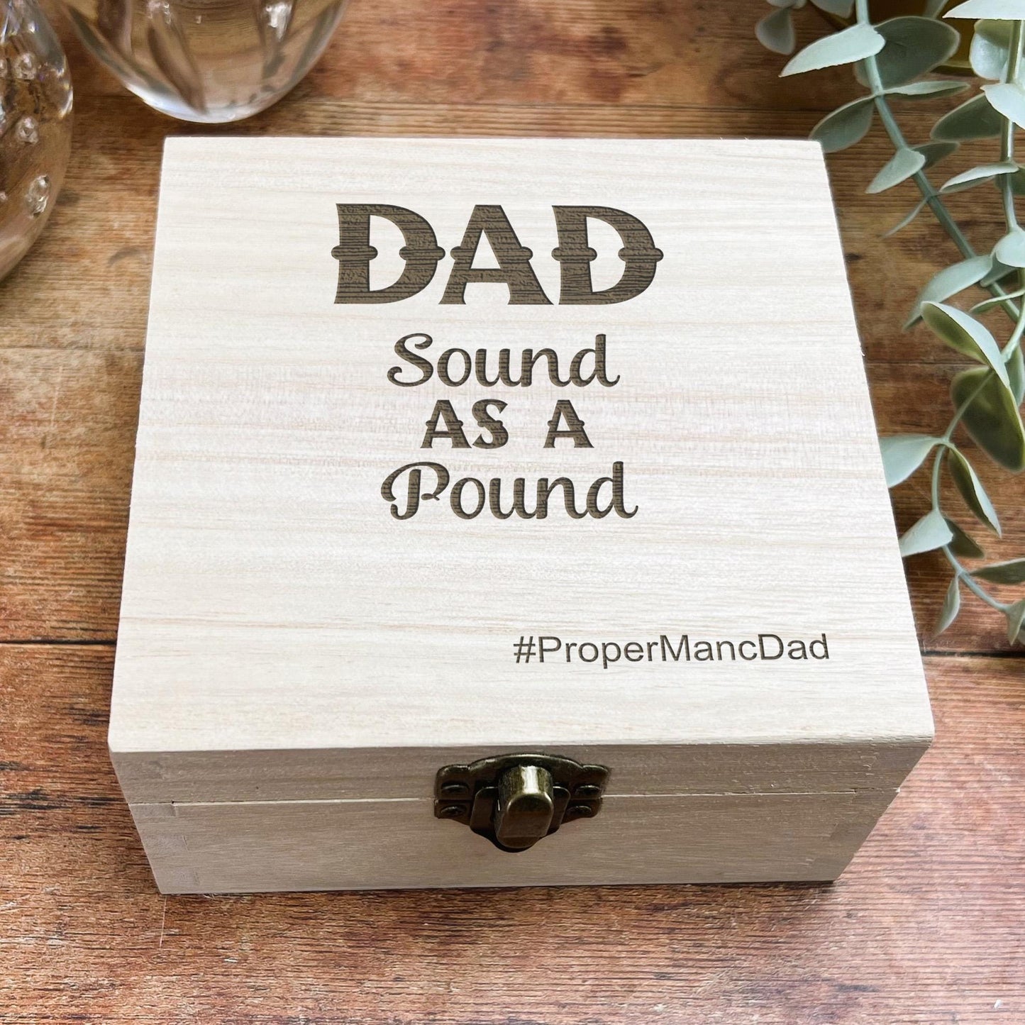 a wooden box that says dad sound as a pound