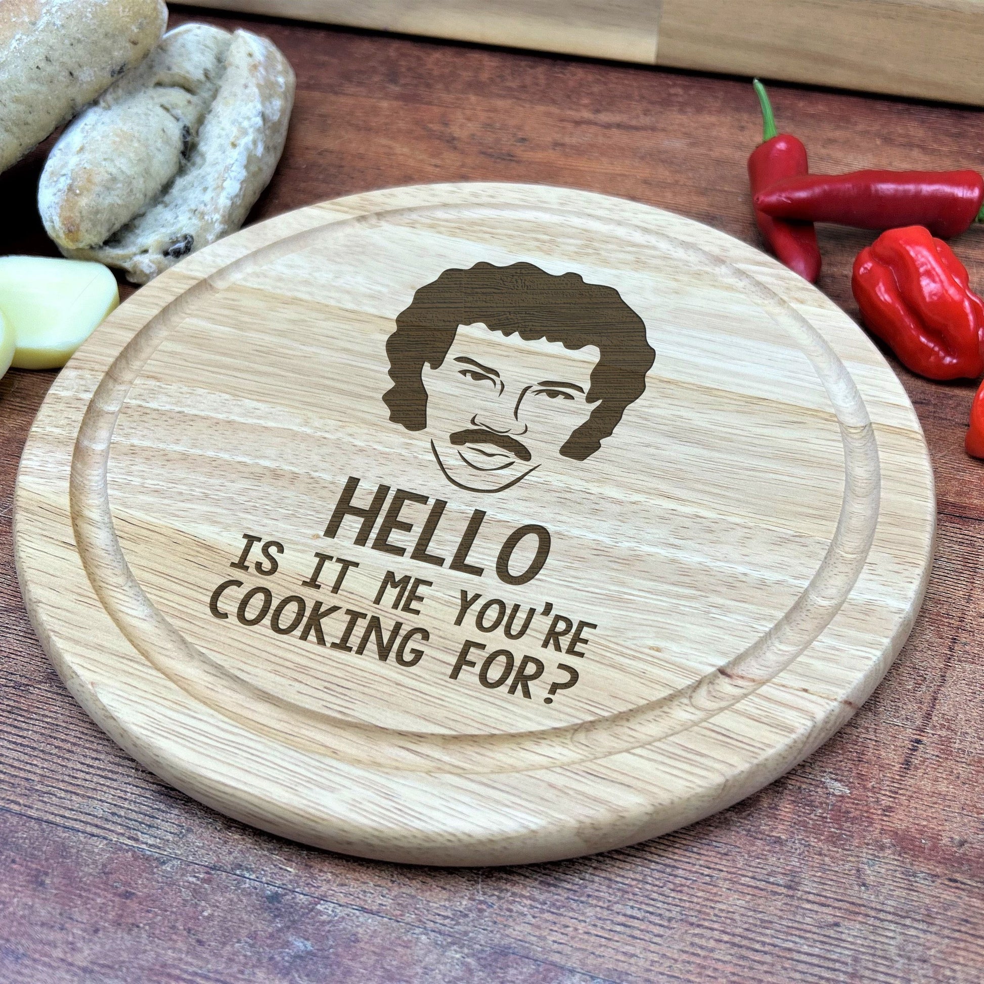 a wooden cutting board with a picture of a man on it
