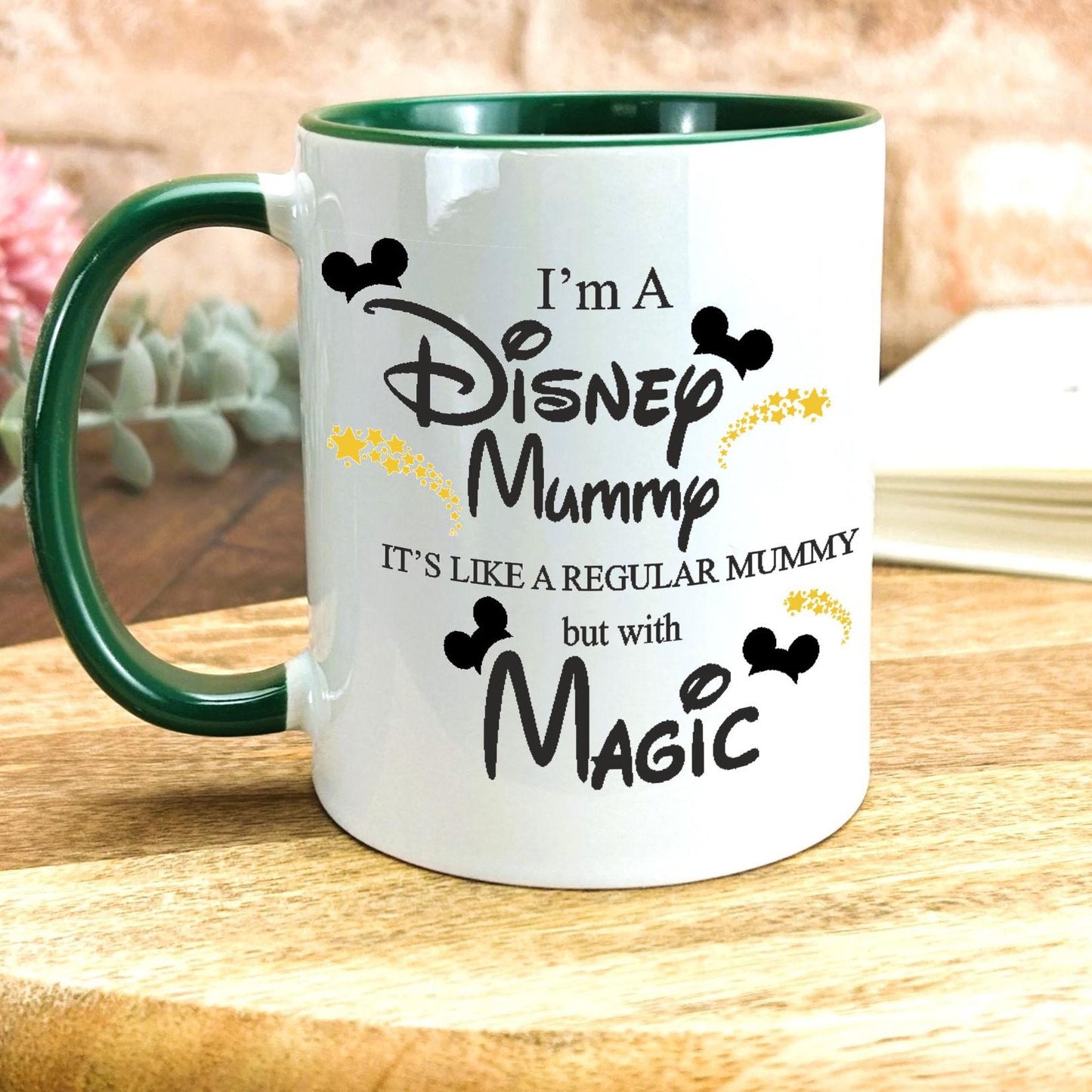 a coffee mug sitting on top of a wooden table