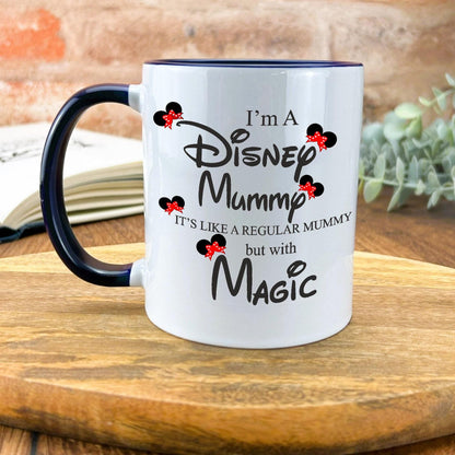 a coffee mug sitting on top of a wooden table