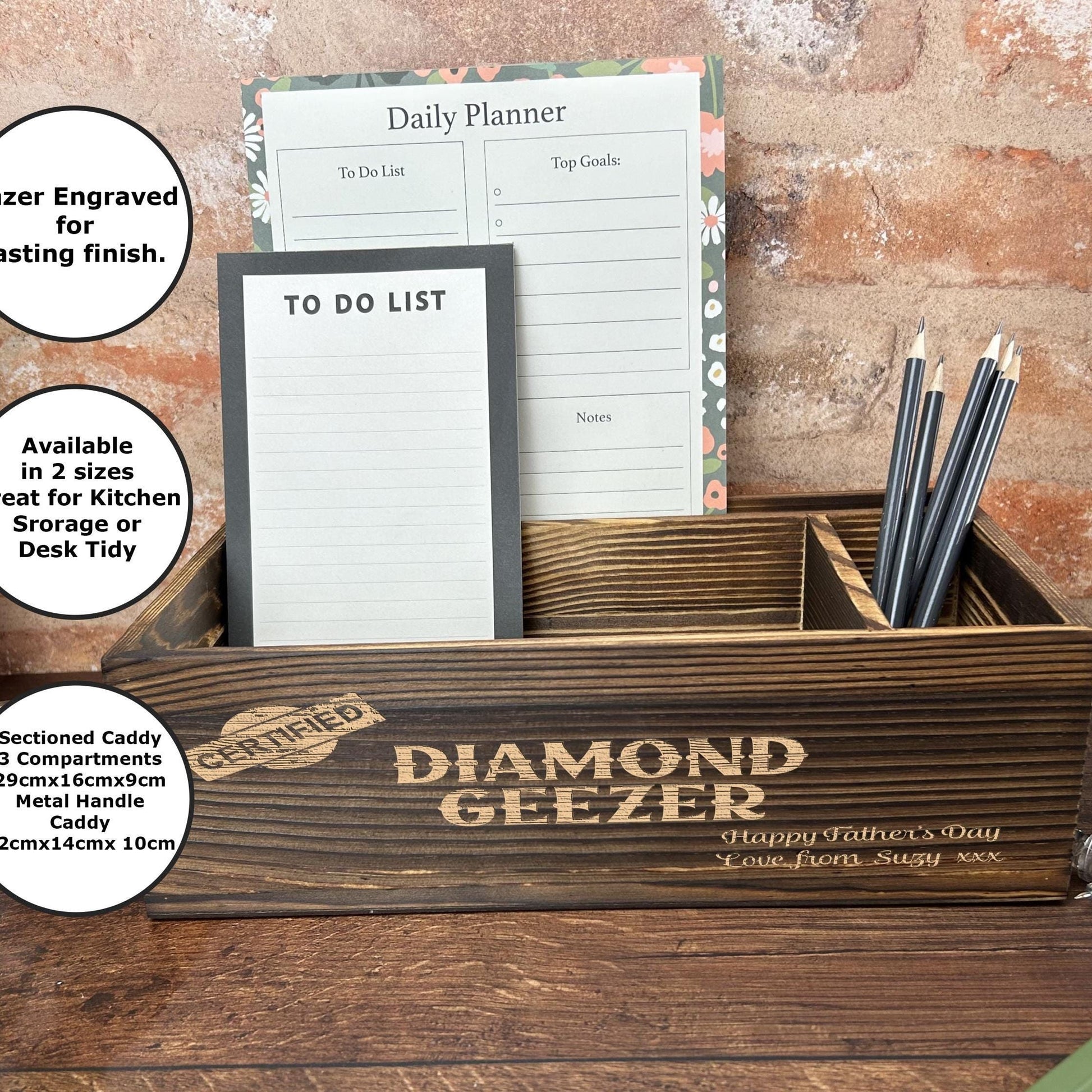 a desk with a pen holder and a notepad holder