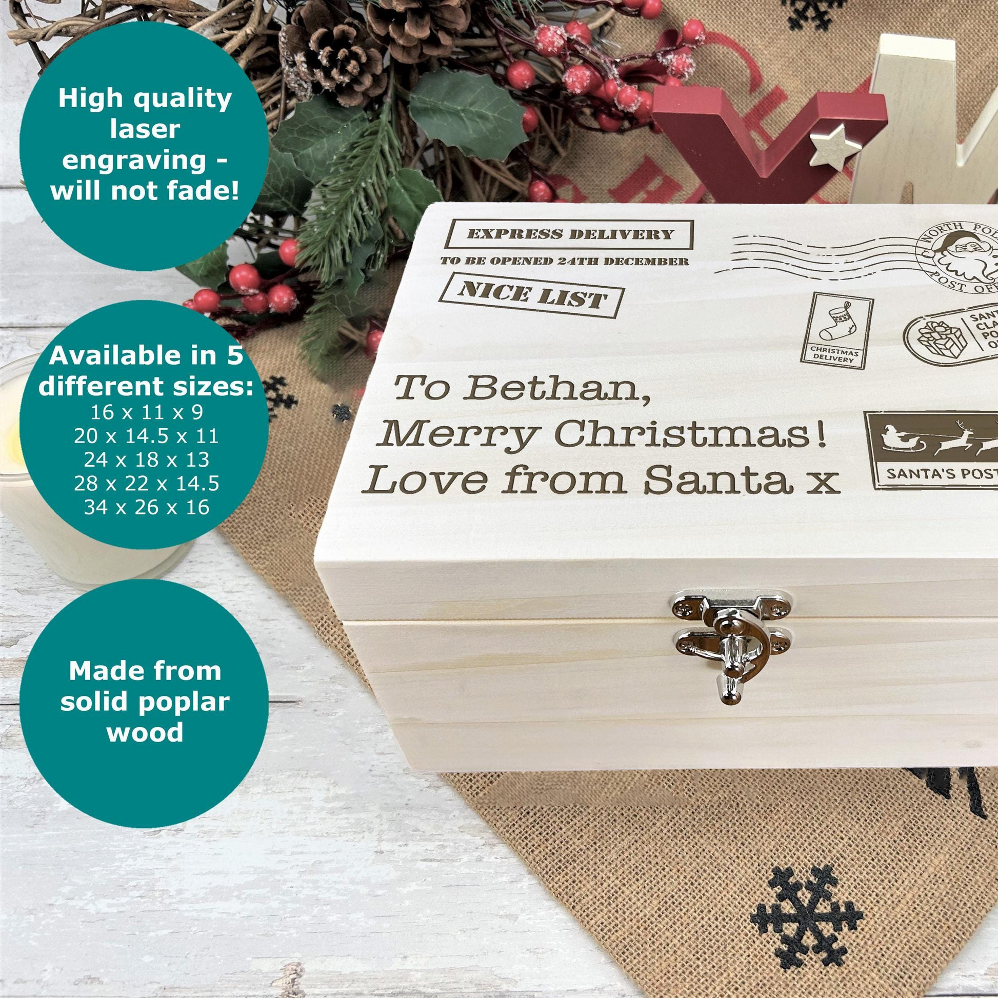 a wooden box with a christmas message on it