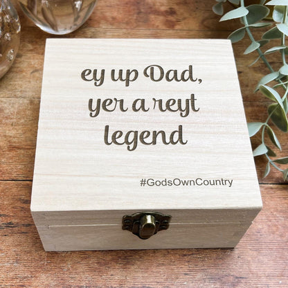 a wooden box with a message on it