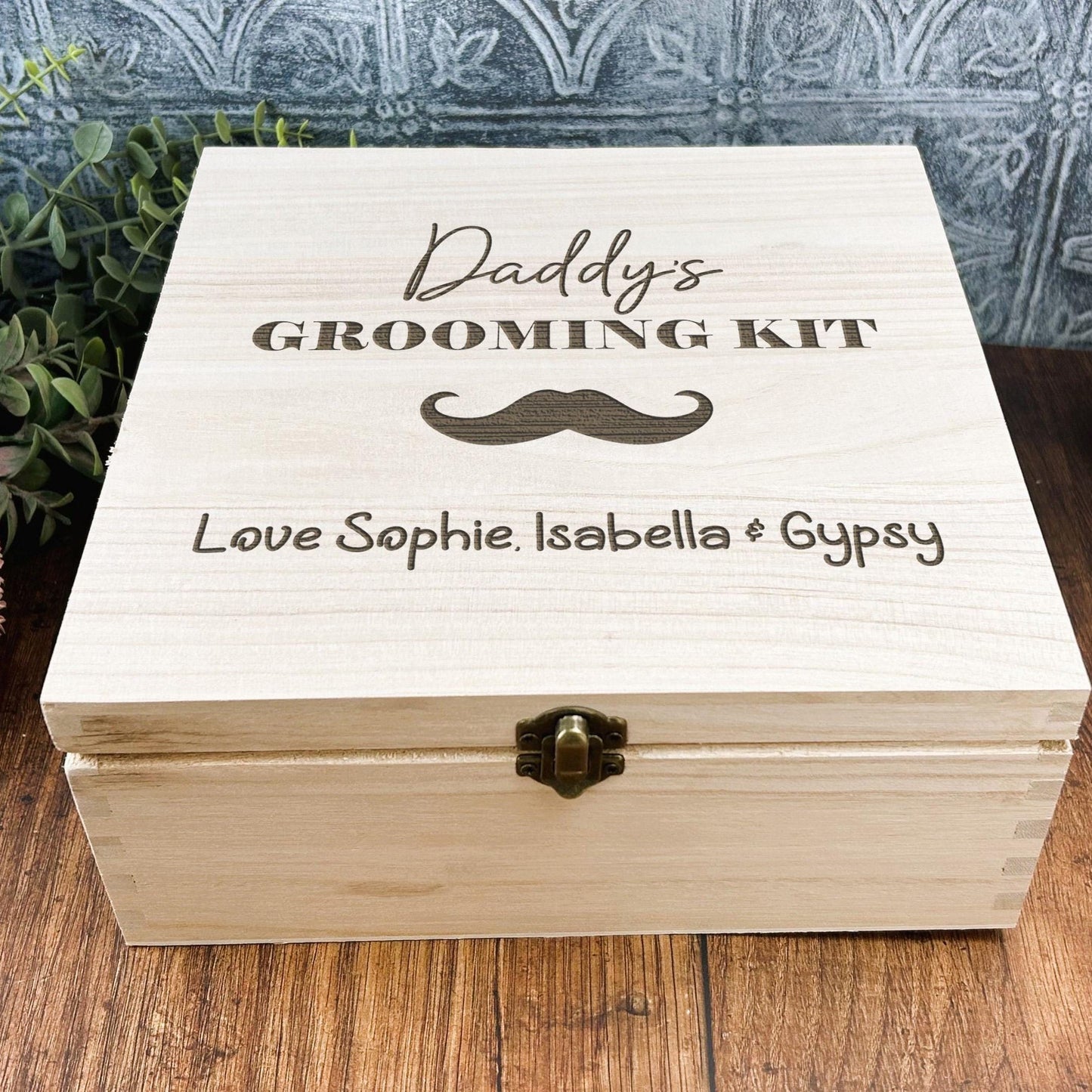 a wooden box sitting on top of a wooden table