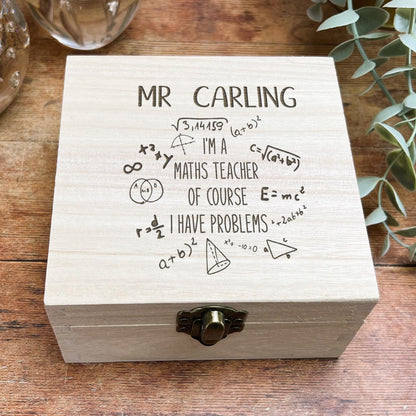 a wooden box that has writing on it