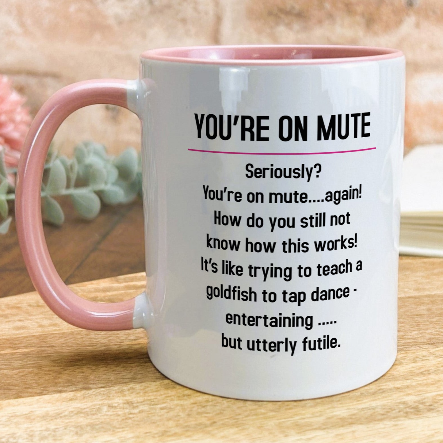 a pink and white coffee mug with a poem on it