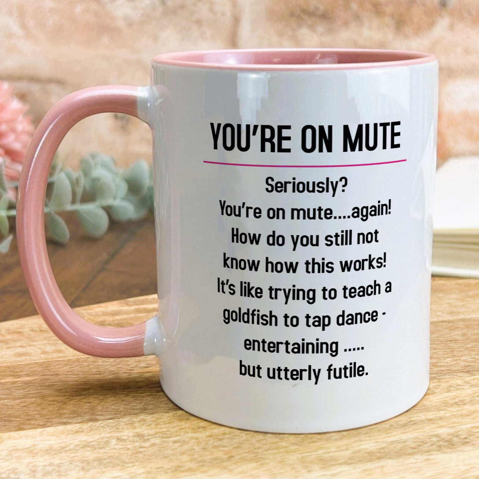 a pink and white coffee mug with a poem on it