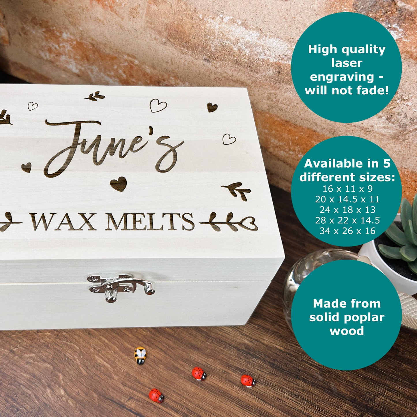 a wooden box with a name and date on it