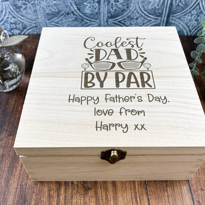 a wooden box sitting on top of a wooden table