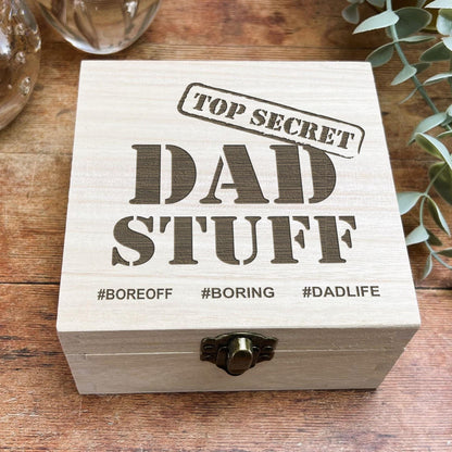 a wooden box sitting on top of a wooden table