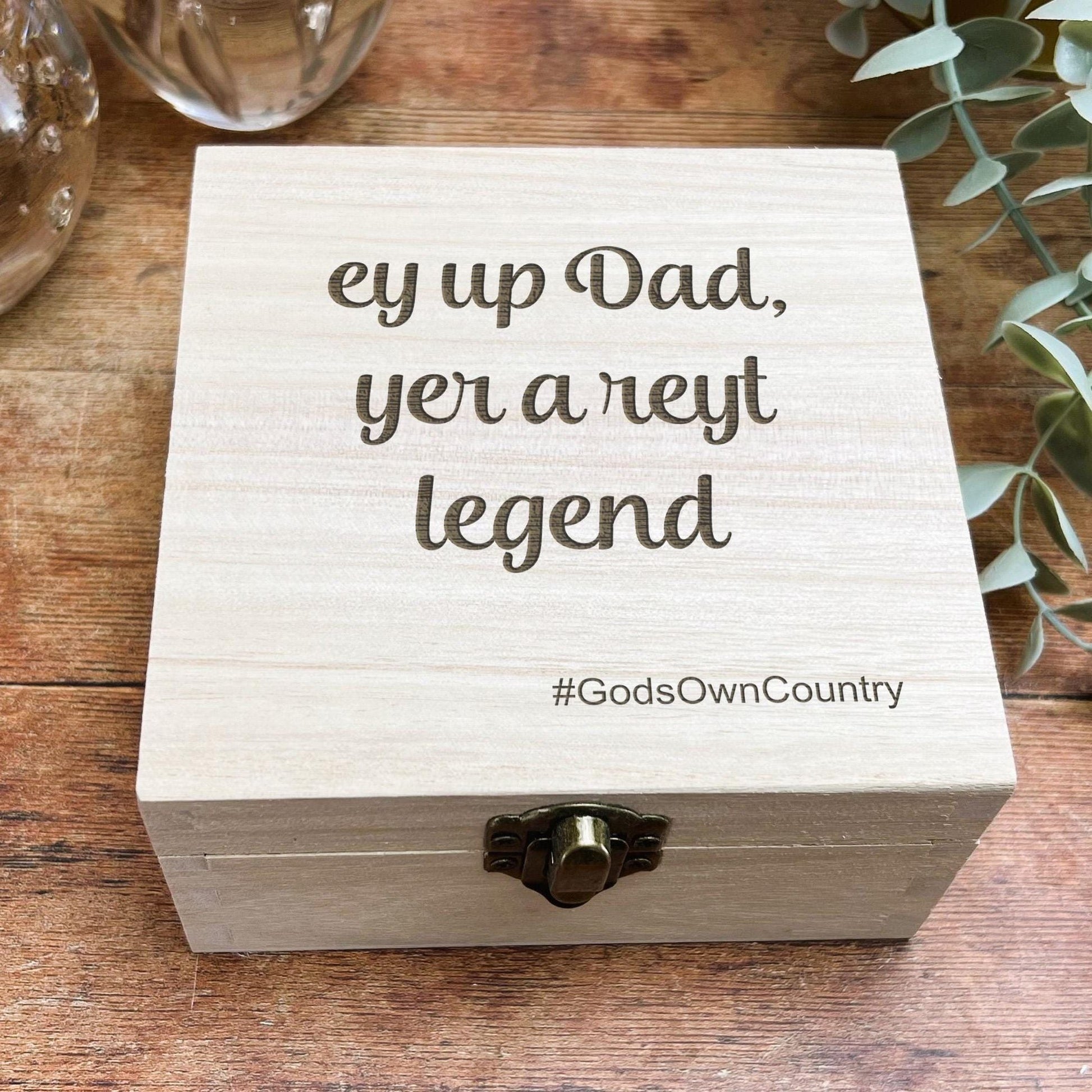 a wooden box with a message on it