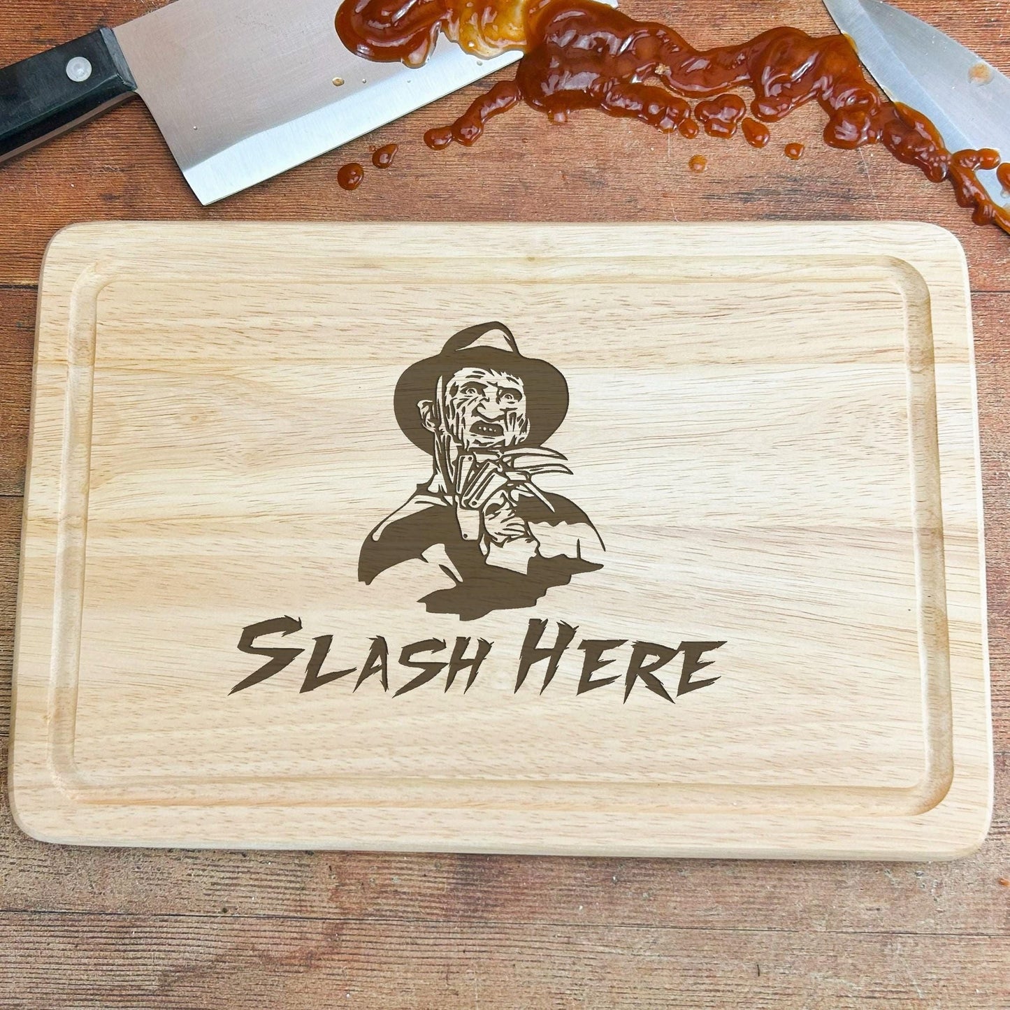 a wooden cutting board with a picture of a man on it