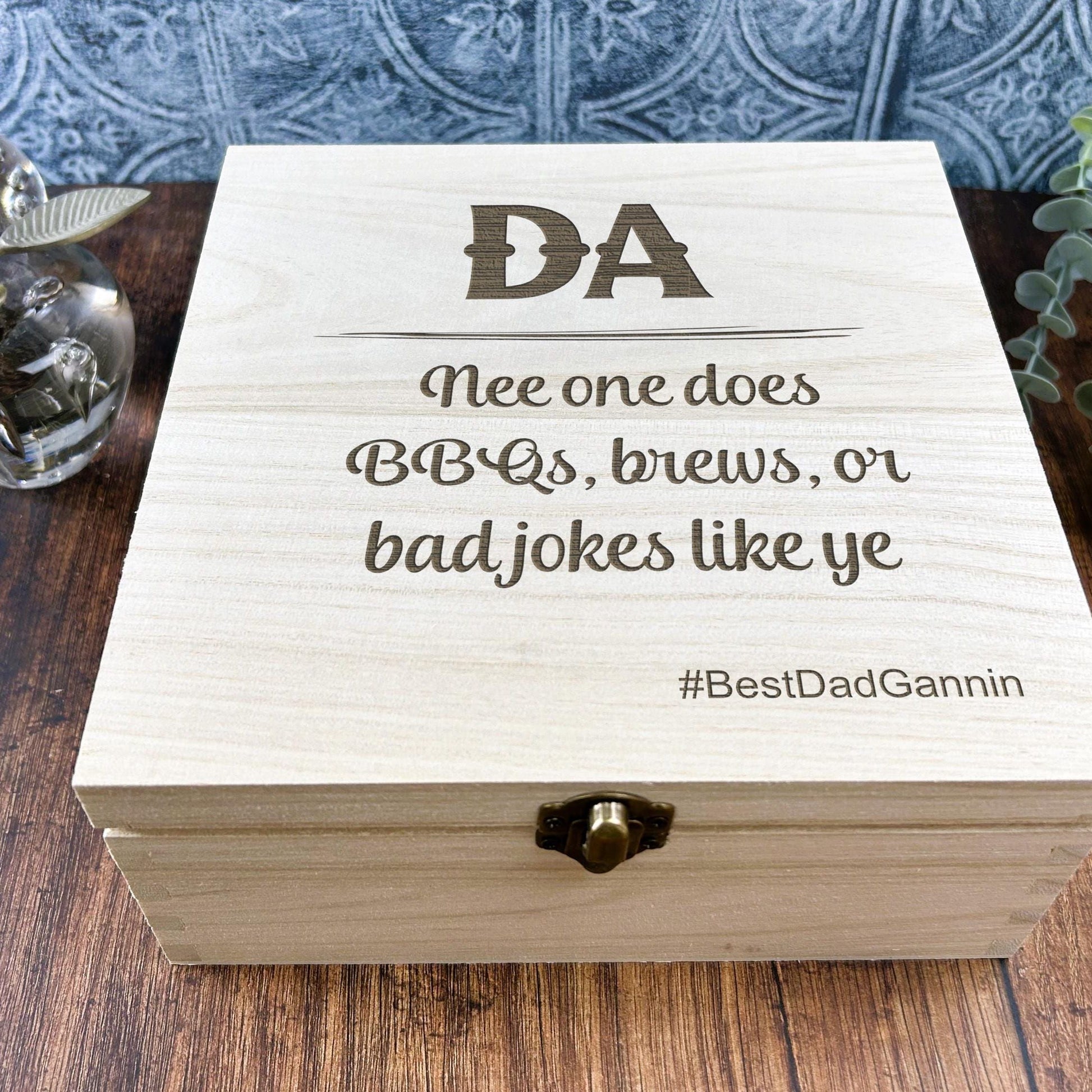a wooden box sitting on top of a wooden table