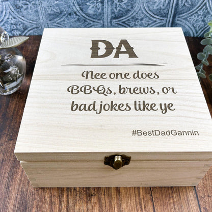 a wooden box sitting on top of a wooden table