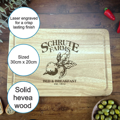a cutting board with olives and a bowl of bread