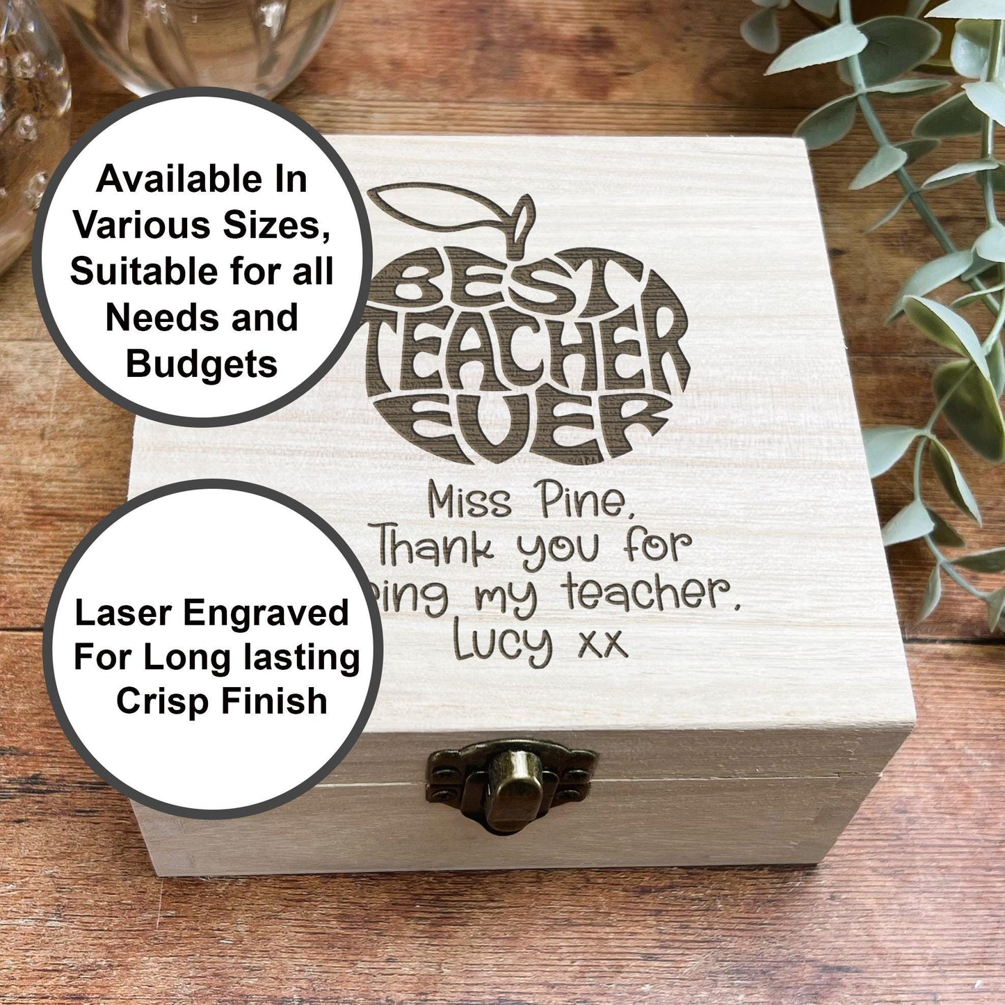 a wooden box with a picture of an apple on it