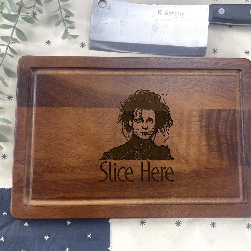 a cutting board with a picture of a person on it