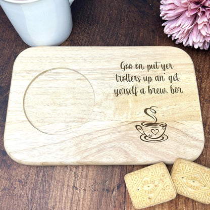 a wooden coaster with a picture of a cup of coffee