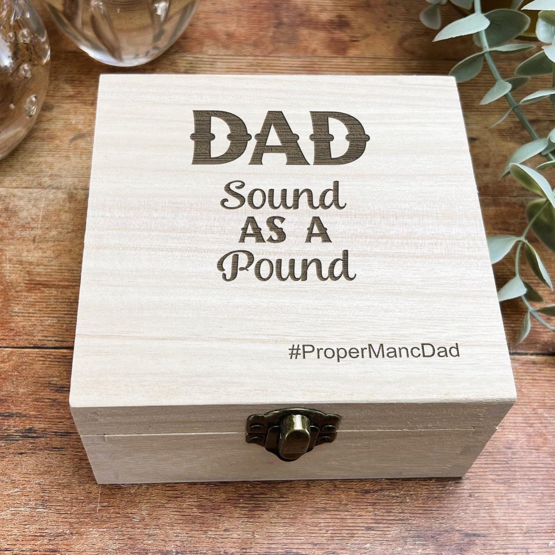 a wooden box that says dad sound as a pound