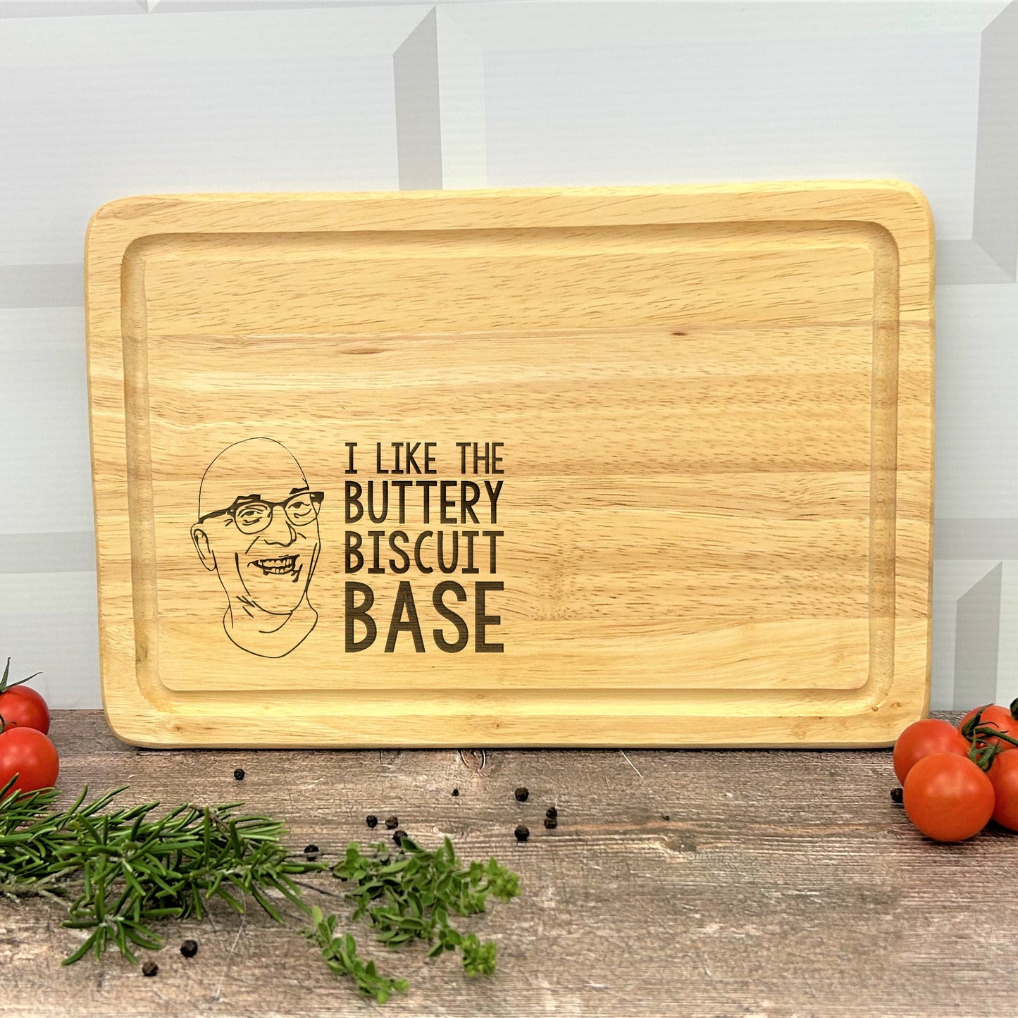 a cutting board that says i like the buttery biscuit base