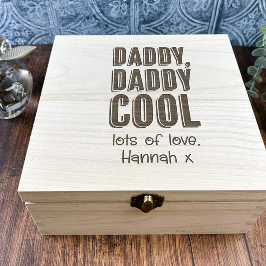 a wooden box sitting on top of a wooden table