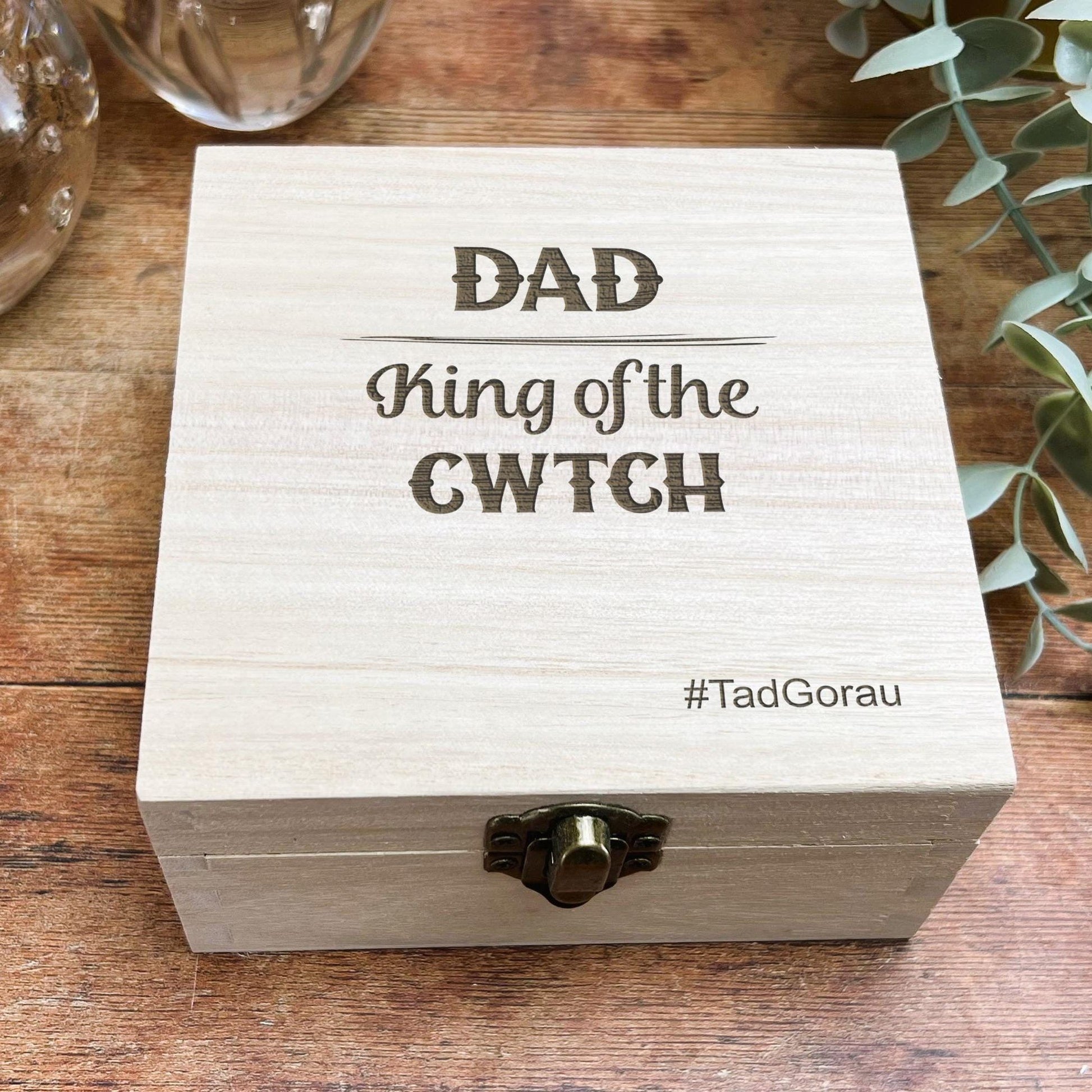a wooden box sitting on top of a wooden table