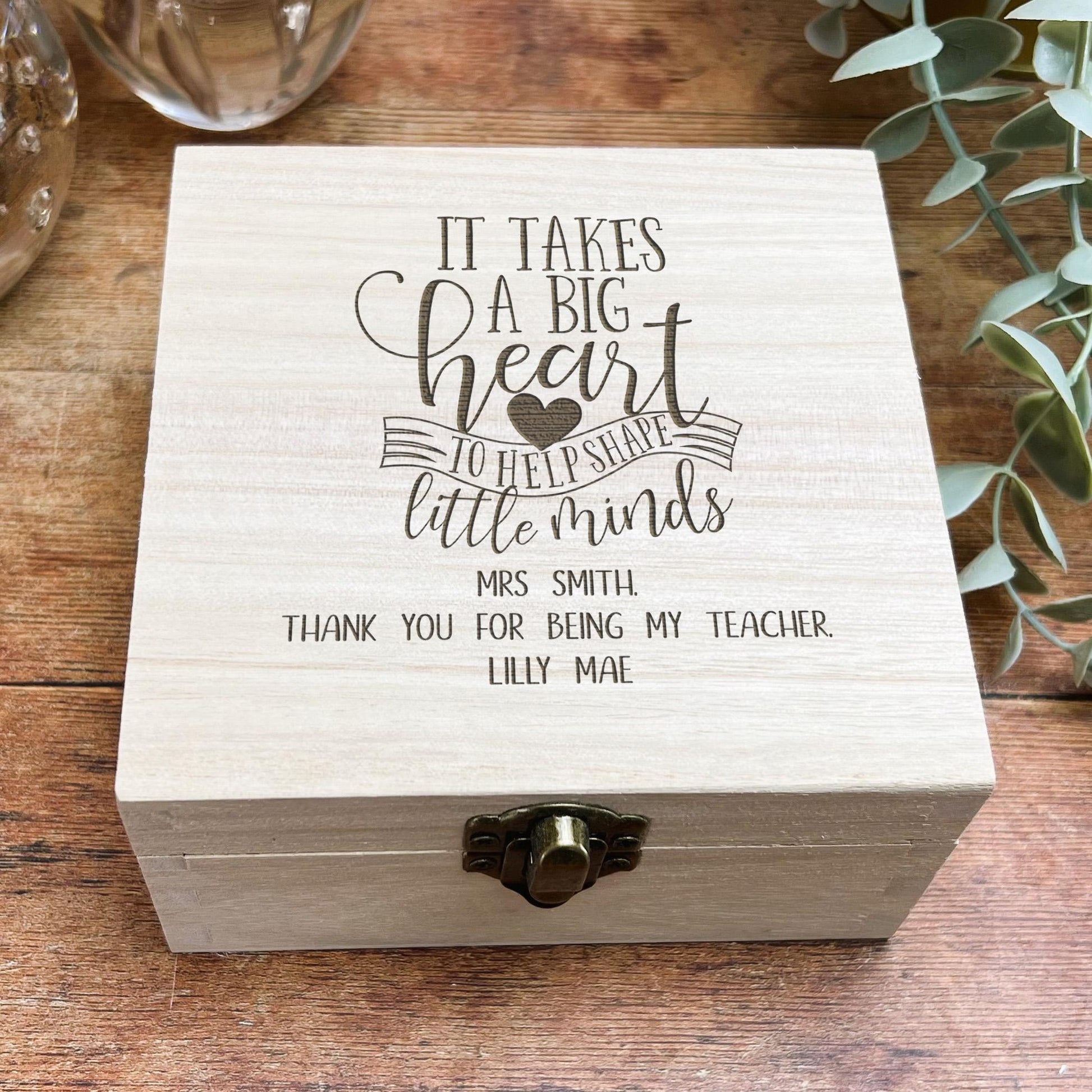 a wooden box with a quote on it