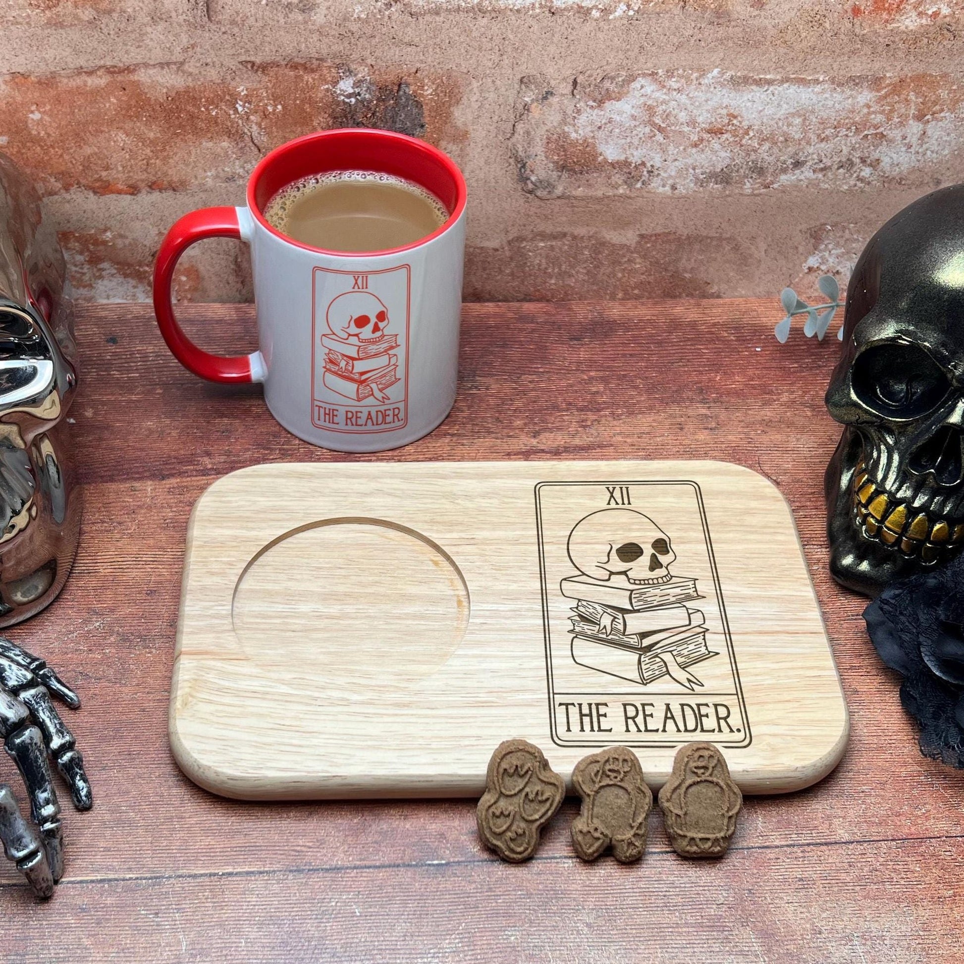 a table topped with skulls and a cup of coffee
