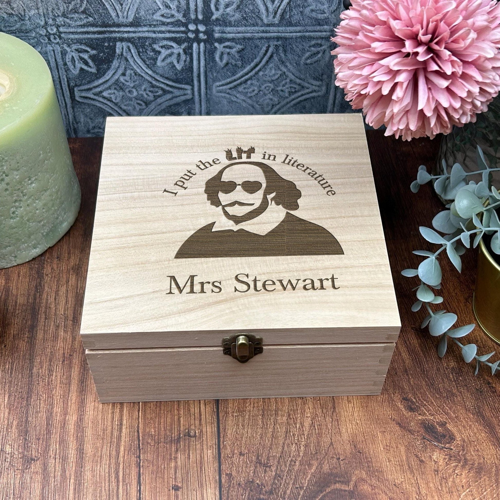 a wooden box sitting on top of a wooden table