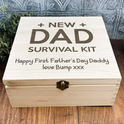 a wooden box that says, new dad survival kit