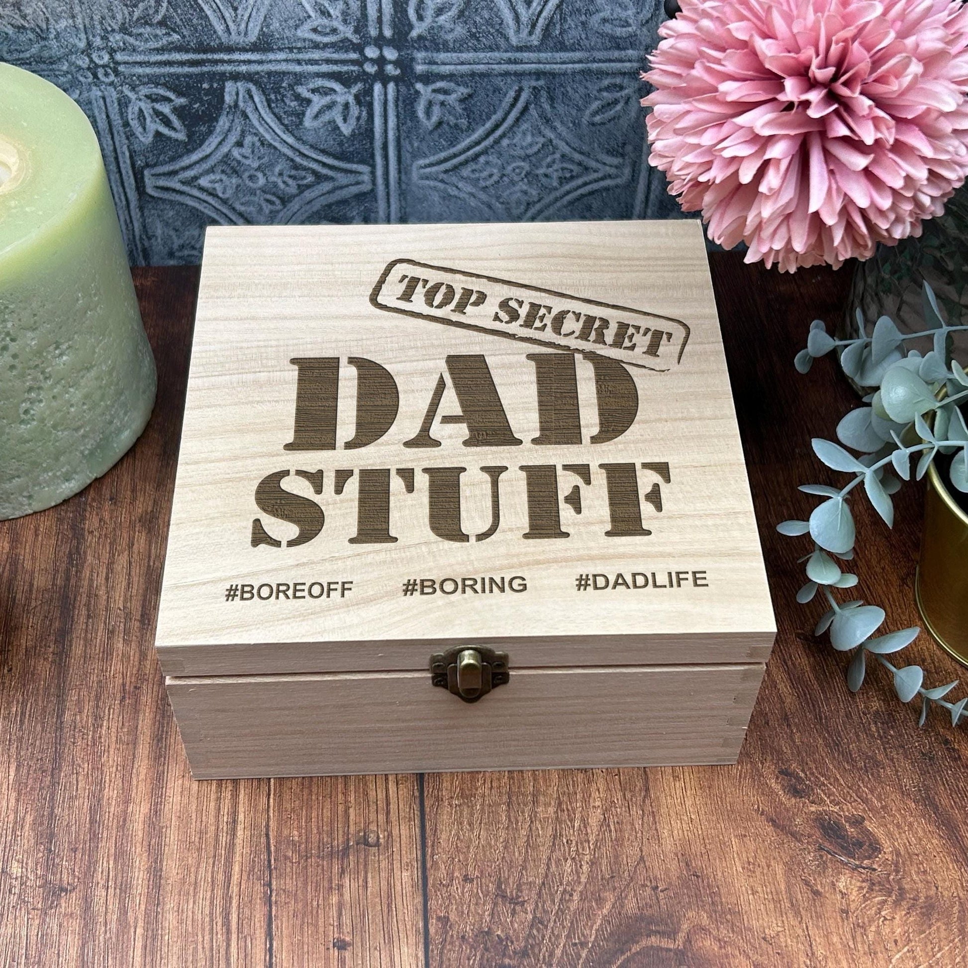 a wooden box sitting on top of a wooden table
