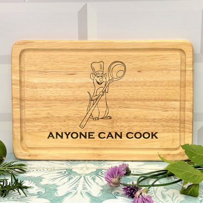 a wooden cutting board with an image of a cartoon character holding a tennis racket