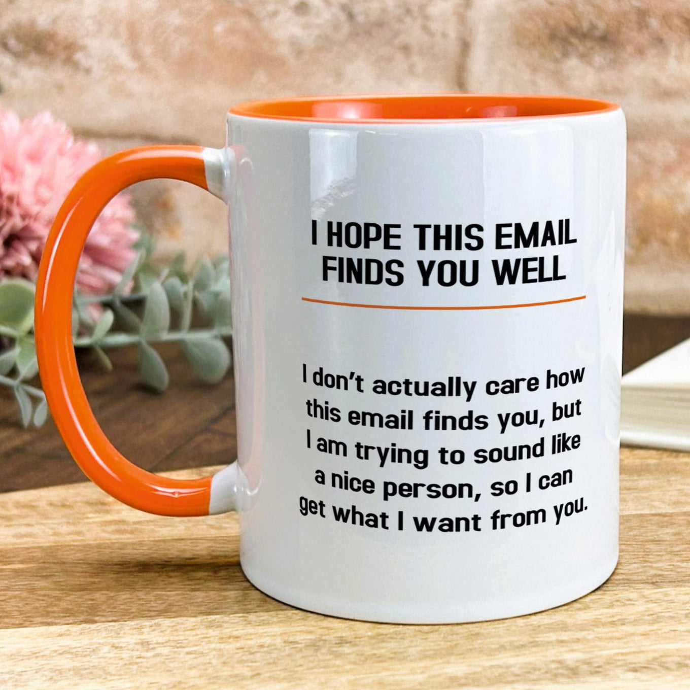 a coffee mug sitting on top of a wooden table