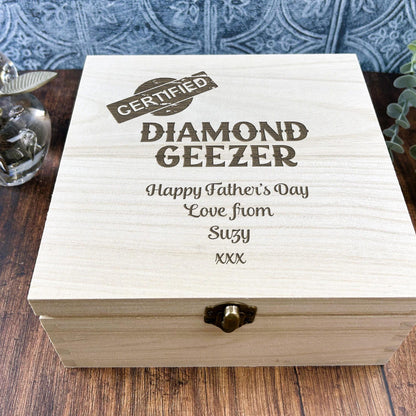 a wooden box sitting on top of a wooden table