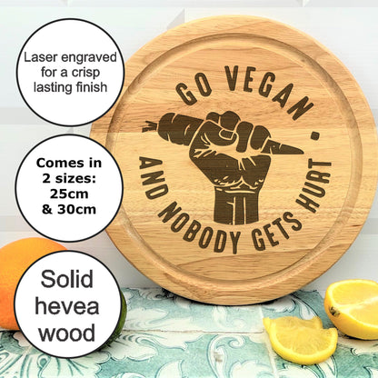 a wooden sign that says go vegan and nobody gets hurt