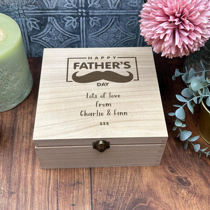 a wooden box with a picture of a mustache on it