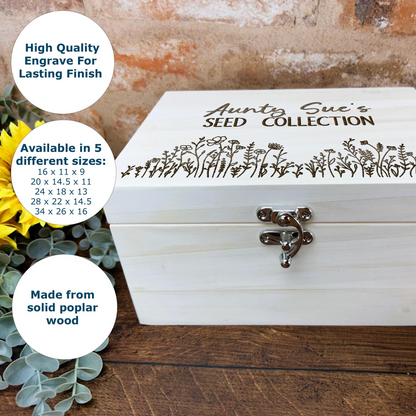 a white wooden box with a sunflower on top of it